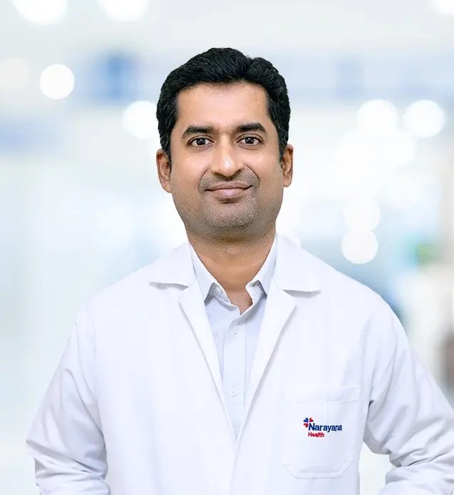 Dr. Kiran R