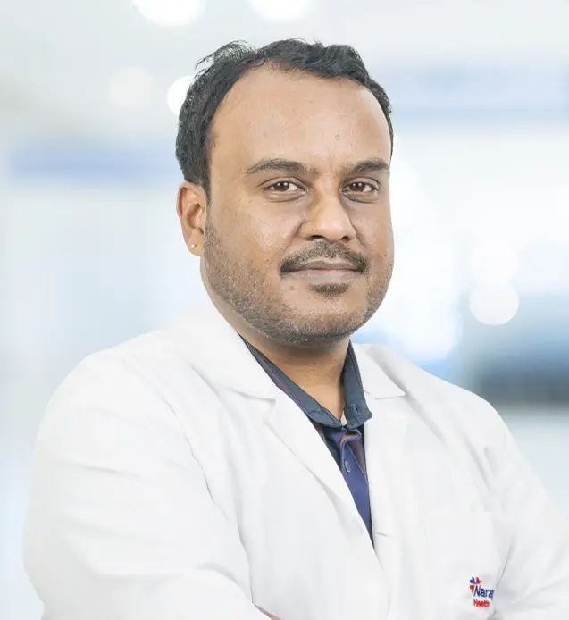 Dr. Ganesh B