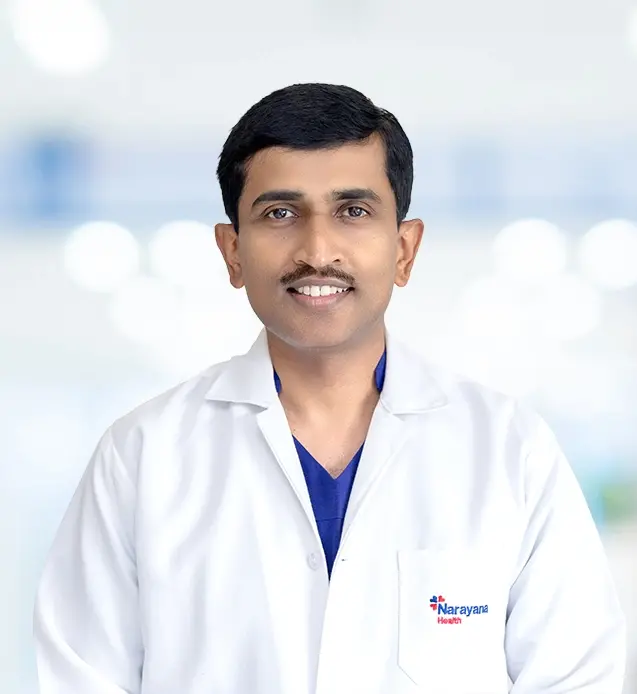 Dr. Kiran K
